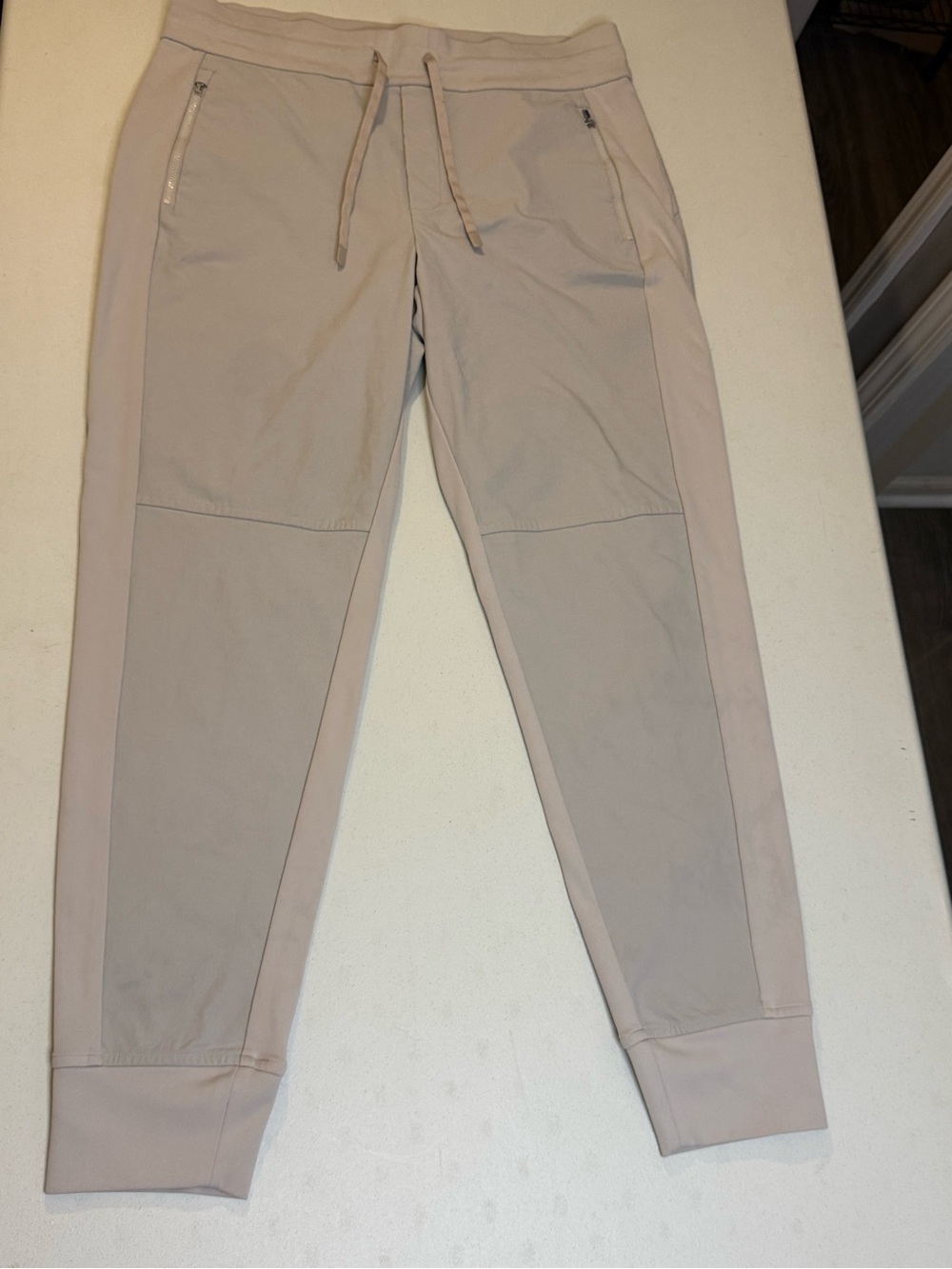 Athleta Women Size 12 Brooklyn Jogger Pants Beige Lightweight Travel Zip Pocket